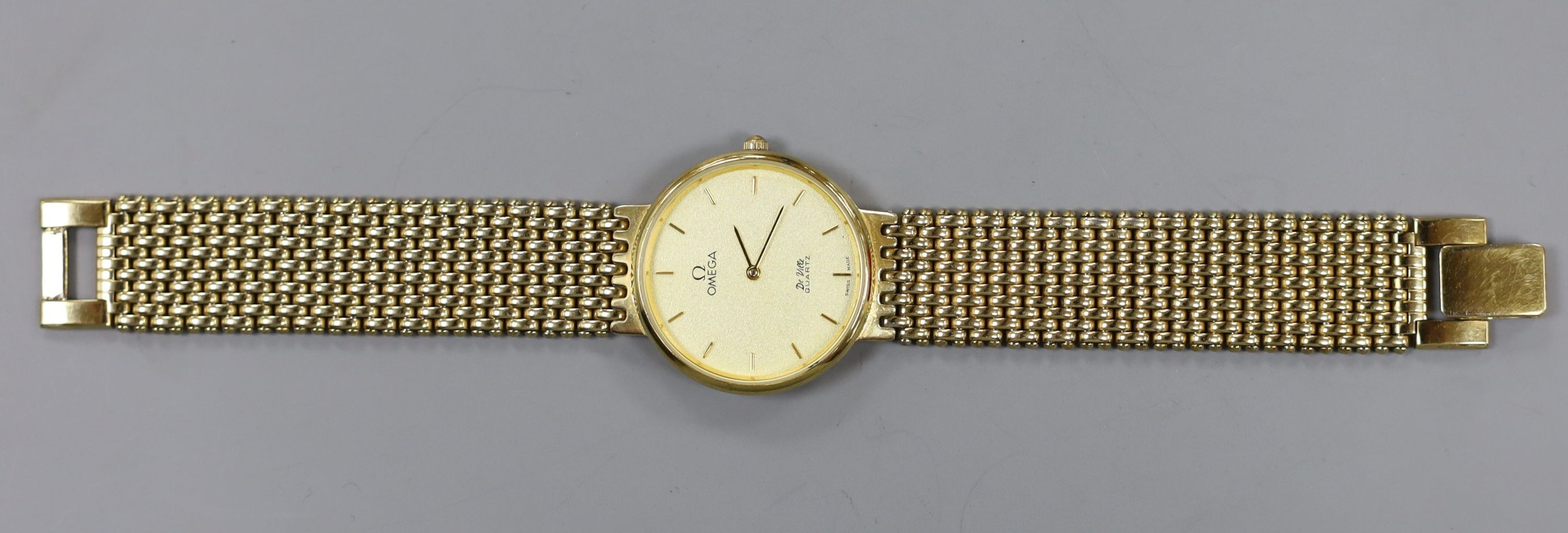 A gentleman's steel and gold plated Omega De Ville quartz wrist watch.